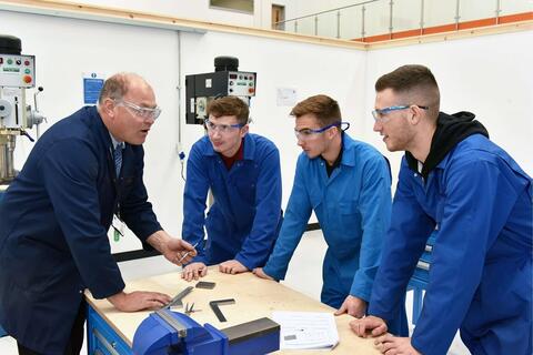 Group of Make UK apprentices being instructed